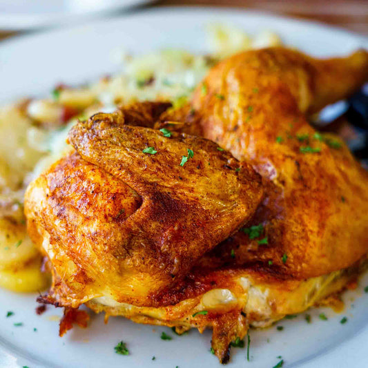 Spice-rubbed chicken with crispy potatoes and gravy